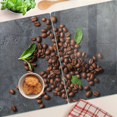 Tagliere in vetro con motivo di chicchi di caffè su sfondo effetto pietra