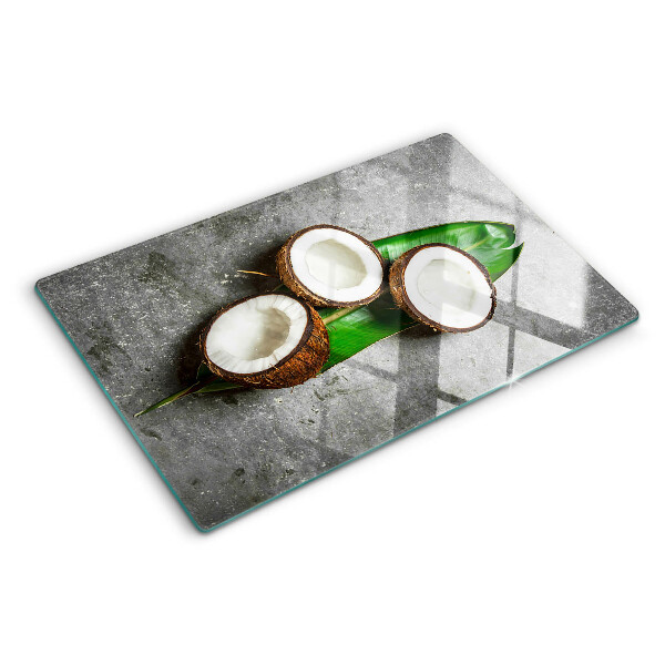 Tagliere in vetro temperato con motivo di cocco su sfondo effetto cemento