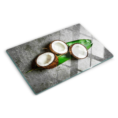 Tagliere in vetro temperato con motivo di cocco su sfondo effetto cemento