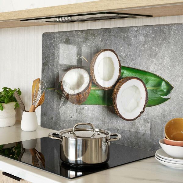 Tagliere in vetro temperato con motivo di cocco su sfondo effetto cemento