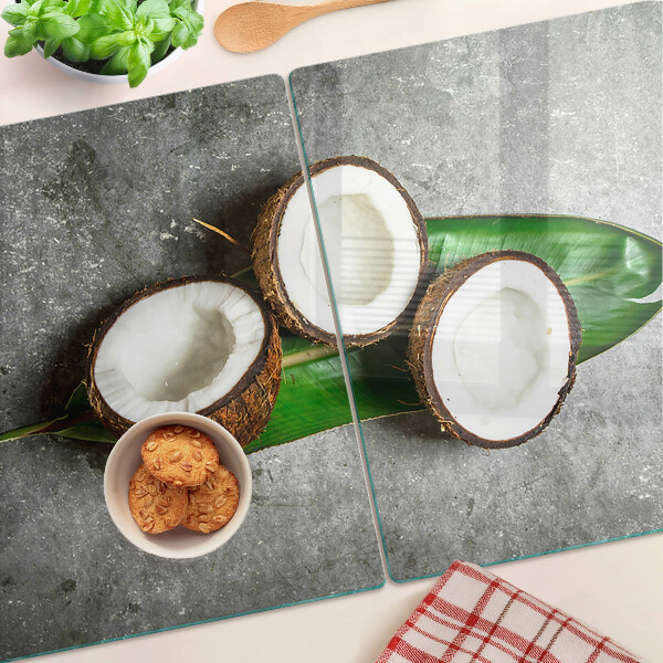 Tagliere in vetro temperato con motivo di cocco su sfondo effetto cemento