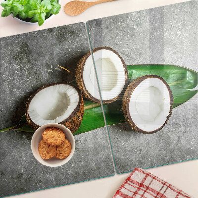 Tagliere in vetro temperato con motivo di cocco su sfondo effetto cemento