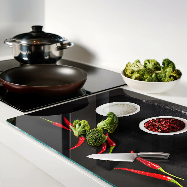 Tagliere in vetro temperato con stampa di spezie e peperoncini rossi