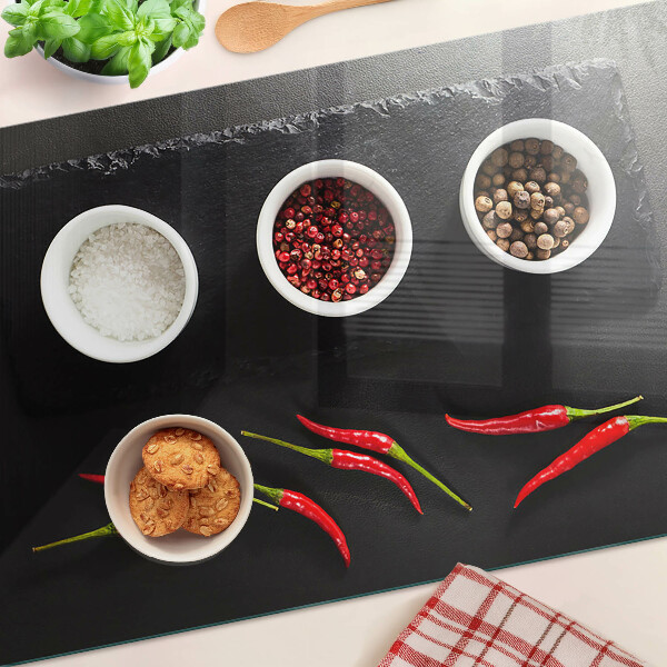 Tagliere in vetro temperato con stampa di spezie e peperoncini rossi