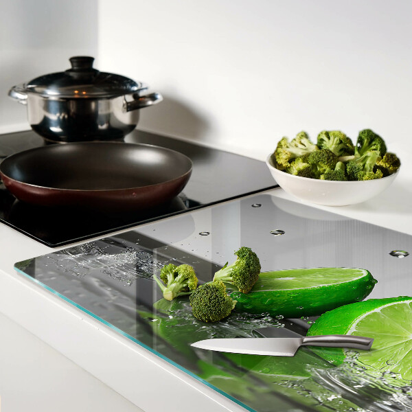 Tagliere in vetro temperato con motivo limoni immersi nell'acqua