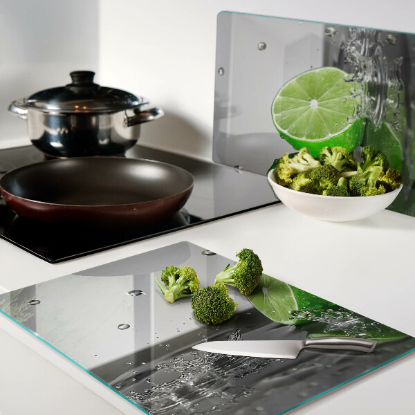 Tagliere in vetro temperato con motivo limoni immersi nell'acqua