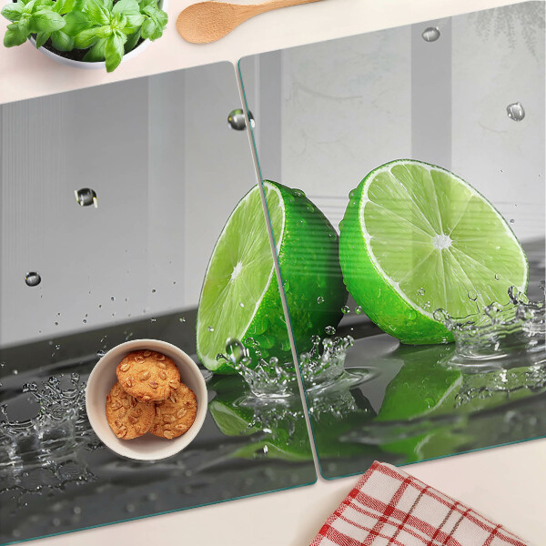 Tagliere in vetro temperato con motivo limoni immersi nell'acqua