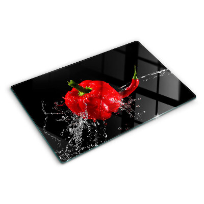 Tagliere in vetro temperato con stampa di peperone rosso immerso in acqua