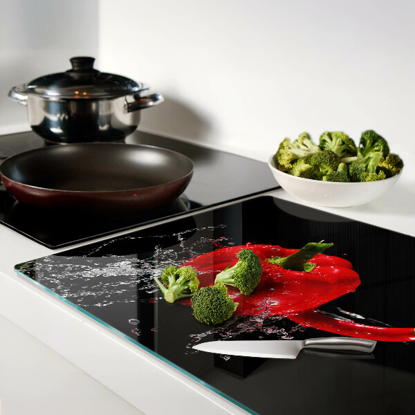 Tagliere in vetro temperato con stampa di peperone rosso immerso in acqua
