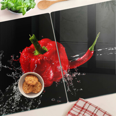 Tagliere in vetro temperato con stampa di peperone rosso immerso in acqua