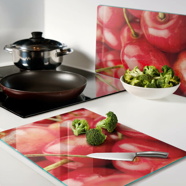 Tagliere in vetro temperato con stampa di ciliegie su sfondo rosso