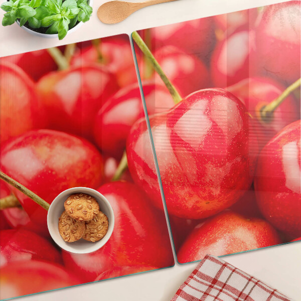 Tagliere in vetro temperato con stampa di ciliegie su sfondo rosso