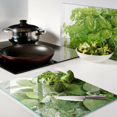Tagliere in vetro temperato con motivo di erbe e foglie verdi