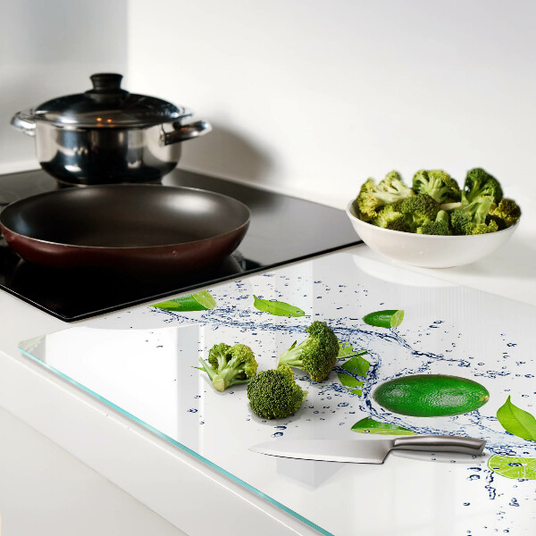 Tagliere in vetro temperato con motivo di limoni e gocce d'acqua con foglie