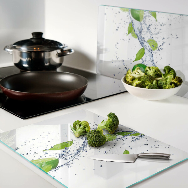 Tagliere in vetro temperato con motivo di limoni e gocce d'acqua con foglie