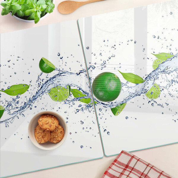 Tagliere in vetro temperato con motivo di limoni e gocce d'acqua con foglie