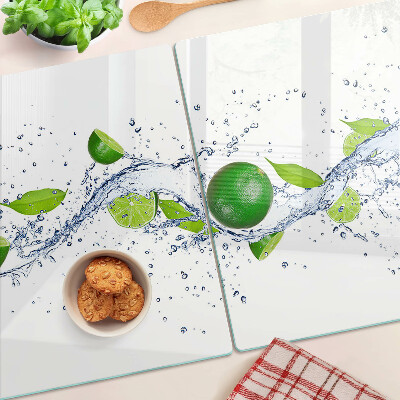Tagliere in vetro temperato con motivo di limoni e gocce d'acqua con foglie