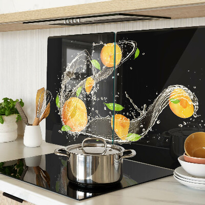 Tagliere in vetro con motivo agrumi immersi in acqua