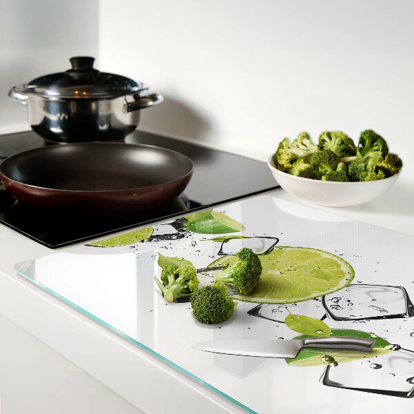 Tagliere in vetro con motivo di limoni immersi in acqua ghiacciata