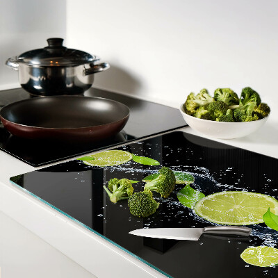 Tagliere in vetro temperato con stampa di limoni in acqua e foglie di menta