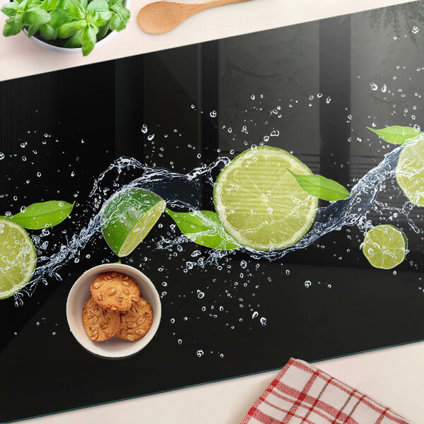 Tagliere in vetro temperato con stampa di limoni in acqua e foglie di menta