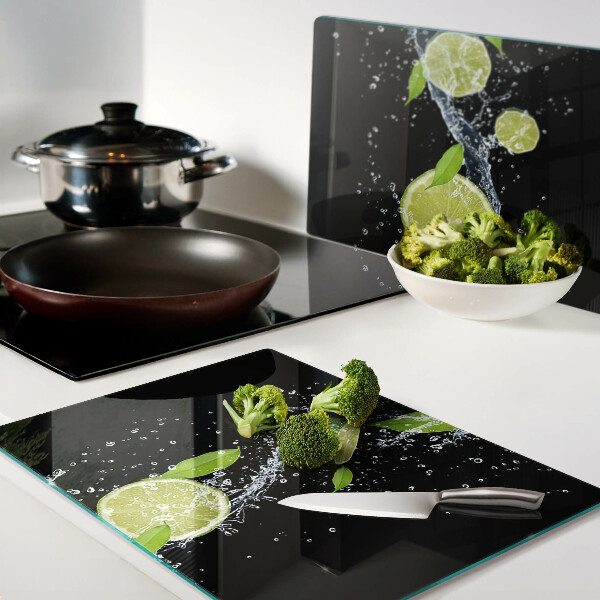 Tagliere in vetro temperato con stampa di limoni in acqua e foglie di menta