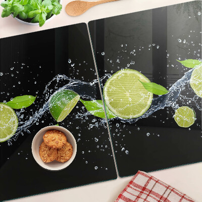 Tagliere in vetro temperato con stampa di limoni in acqua e foglie di menta