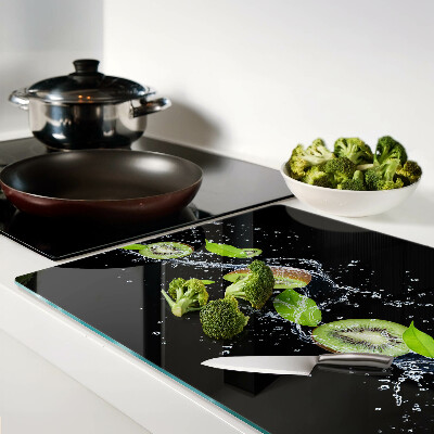 Tagliere in vetro con stampa di kiwi in acqua e foglie