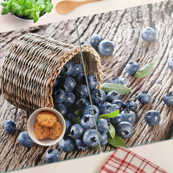 Tagliere in vetro temperato con motivo di mirtilli in un cesto