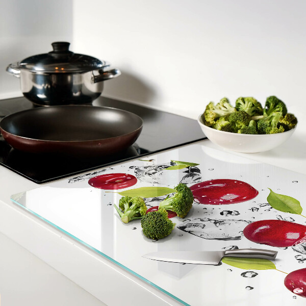 Tagliere in vetro temperato con motivo di mele rosse su sfondo ghiacciato