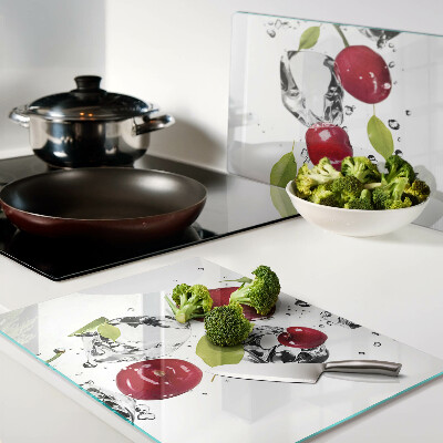 Tagliere in vetro temperato con motivo di mele rosse su sfondo ghiacciato