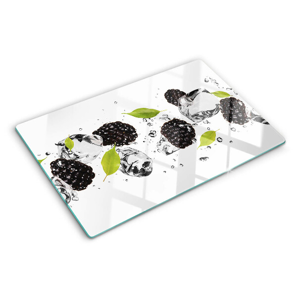 Tagliere in vetro temperato con stampa di lamponi con foglie e gocce d'acqua