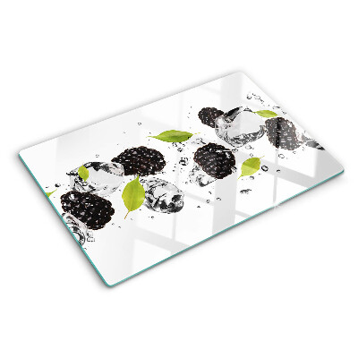 Tagliere in vetro temperato con stampa di lamponi con foglie e gocce d'acqua