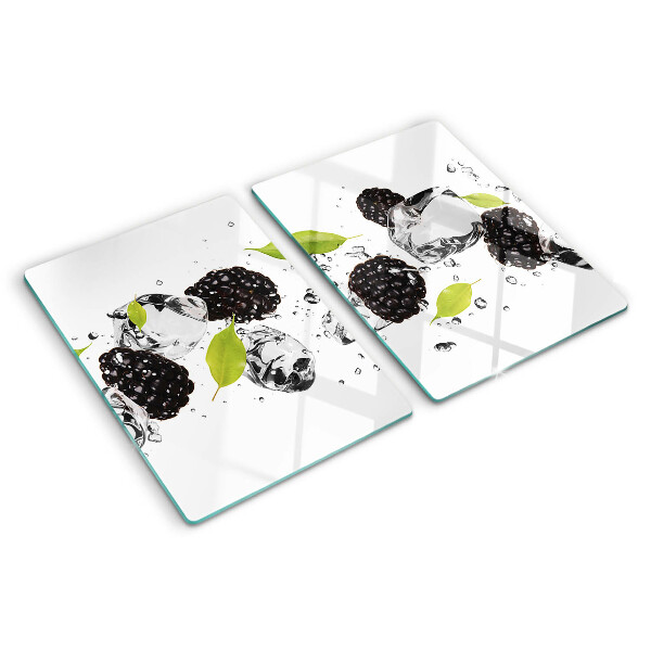Tagliere in vetro temperato con stampa di lamponi con foglie e gocce d'acqua