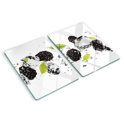 Tagliere in vetro temperato con stampa di lamponi con foglie e gocce d'acqua