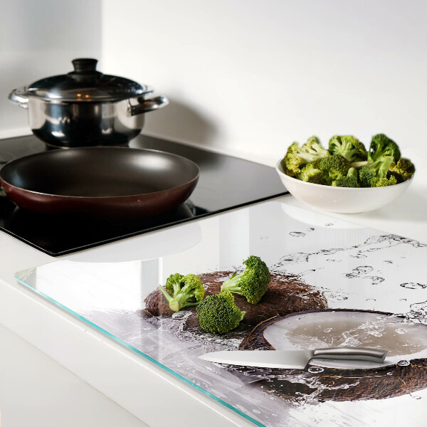 Tagliere in vetro temperato con motivo cocco immerso nell'acqua