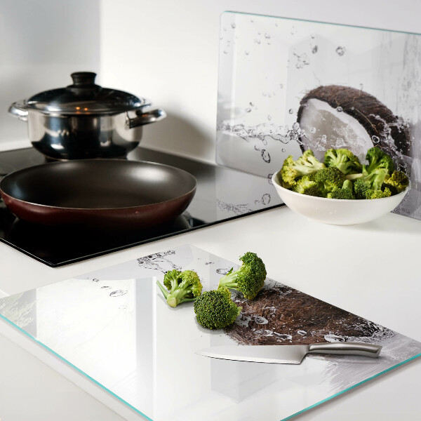 Tagliere in vetro temperato con motivo cocco immerso nell'acqua