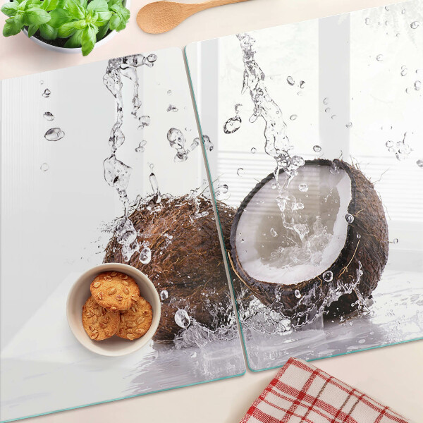 Tagliere in vetro temperato con motivo cocco immerso nell'acqua