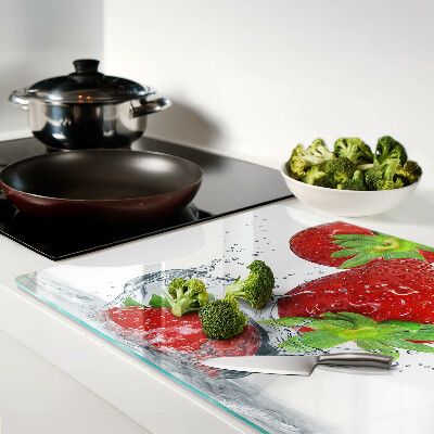 Tagliere in vetro temperato con motivo fragole immerse in acqua
