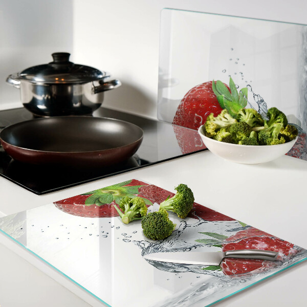 Tagliere in vetro temperato con motivo fragole immerse in acqua