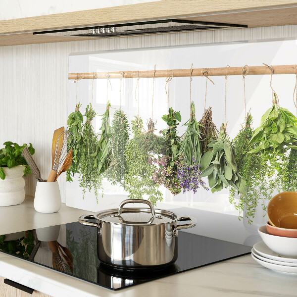 Tagliere in vetro temperato con stampa di erbe essiccate su sfondo a spago