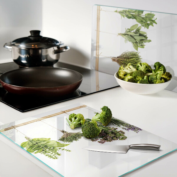 Tagliere in vetro temperato con stampa di erbe essiccate legate con spago