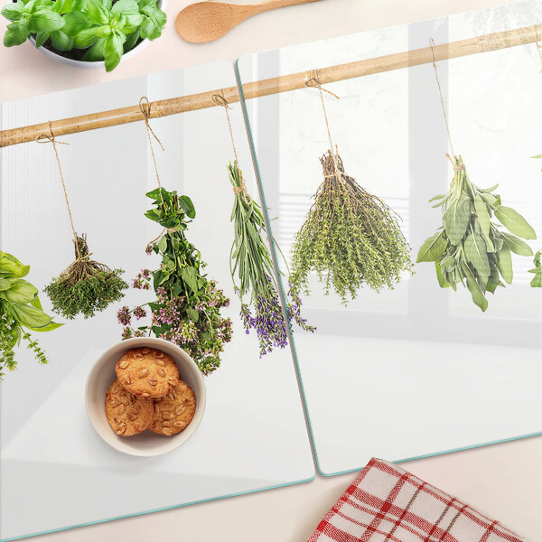 Tagliere in vetro temperato con stampa di erbe essiccate legate con spago