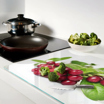 Tagliere in vetro con motivo di mirtilli rossi e foglie