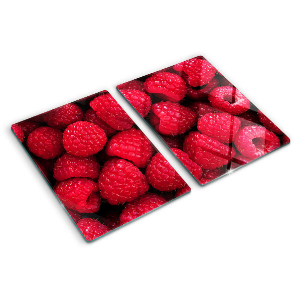 Tagliere in vetro temperato con stampa di lamponi sullo sfondo