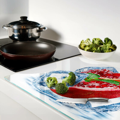 Tagliere in vetro temperato con motivo melograno su sfondo ghiacciato