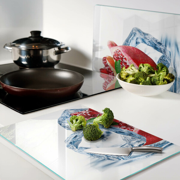 Tagliere in vetro temperato con motivo melograno su sfondo ghiacciato