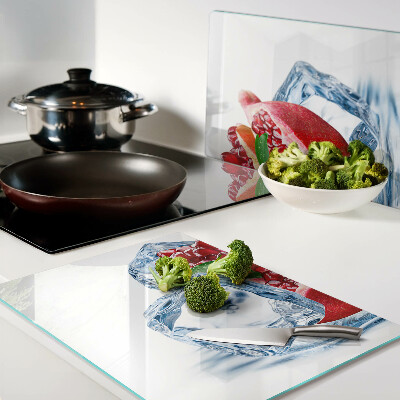 Tagliere in vetro temperato con motivo melograno su sfondo ghiacciato