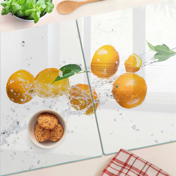 Tagliere in vetro temperato con motivo agrumi immersi in acqua