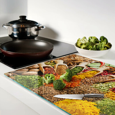 Tagliere in vetro con motivo di spezie ed erbe